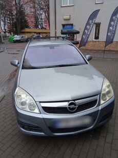 Bagażnik Amos Alfa na relingi do Opel Vectra C kombi 2002->2008