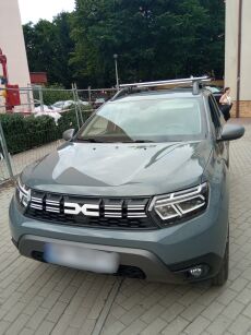 Bagażnik Amos ALFA Dynamic na reling do Dacia Duster 2023->